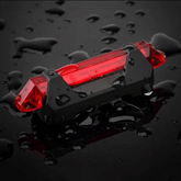 Portable red bicycle tail light