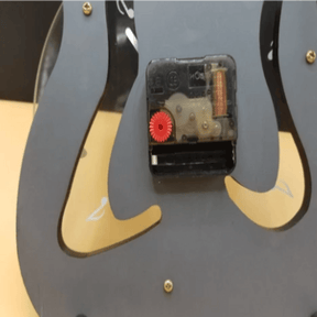Guitar shaped wall clock black