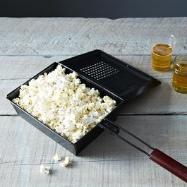 Campfire corn popper popcorn