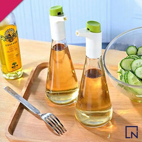 Oil - vinegar cruet set with adjustable flow control - green